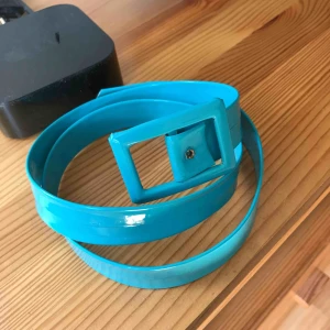  - Turkost / blått skärp! 45 kronor inkluderat frakt. 