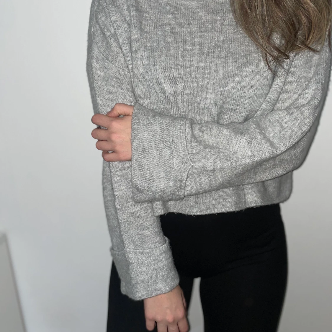 Stickad tröja med polo