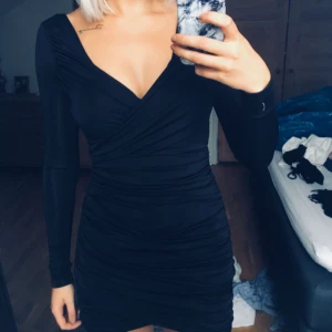  - Supersnygg fodralklänning.