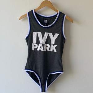 Ivy Park grey bodysuit. Colored trims and logo print on the chest. Size XS (size big, good for size S as well). Very good condition, worn only once.