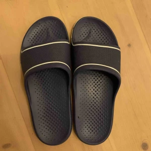  - Tofflor, aldrig använt, bra skick