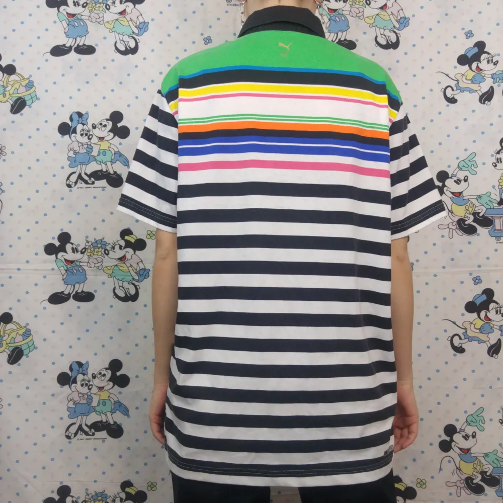Supersnygg unik randig puma-tröja med regnbågsfärger på ryggen. Är lite grå i de svarta färgerna men bortsett från det är den i tiptop skick! Köparen står för frakten, samfraktar gärna 😊👍. T-shirts.