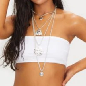  - Helt ny vit bikini! Den andra bilden är modellen på trosorna fast dom är vita och inte orangea. 