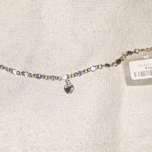 Armband guldigt  - Superfint gulligt Aramband som aldrig blivit använt som ni ser är påsen den Kom i fortfarande kvar. 
