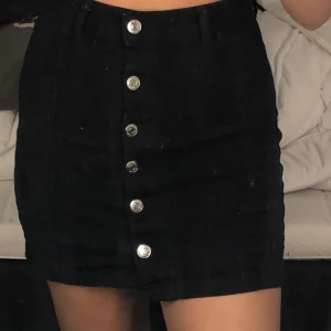 Kjol - En ginatrico kjol men knappar 