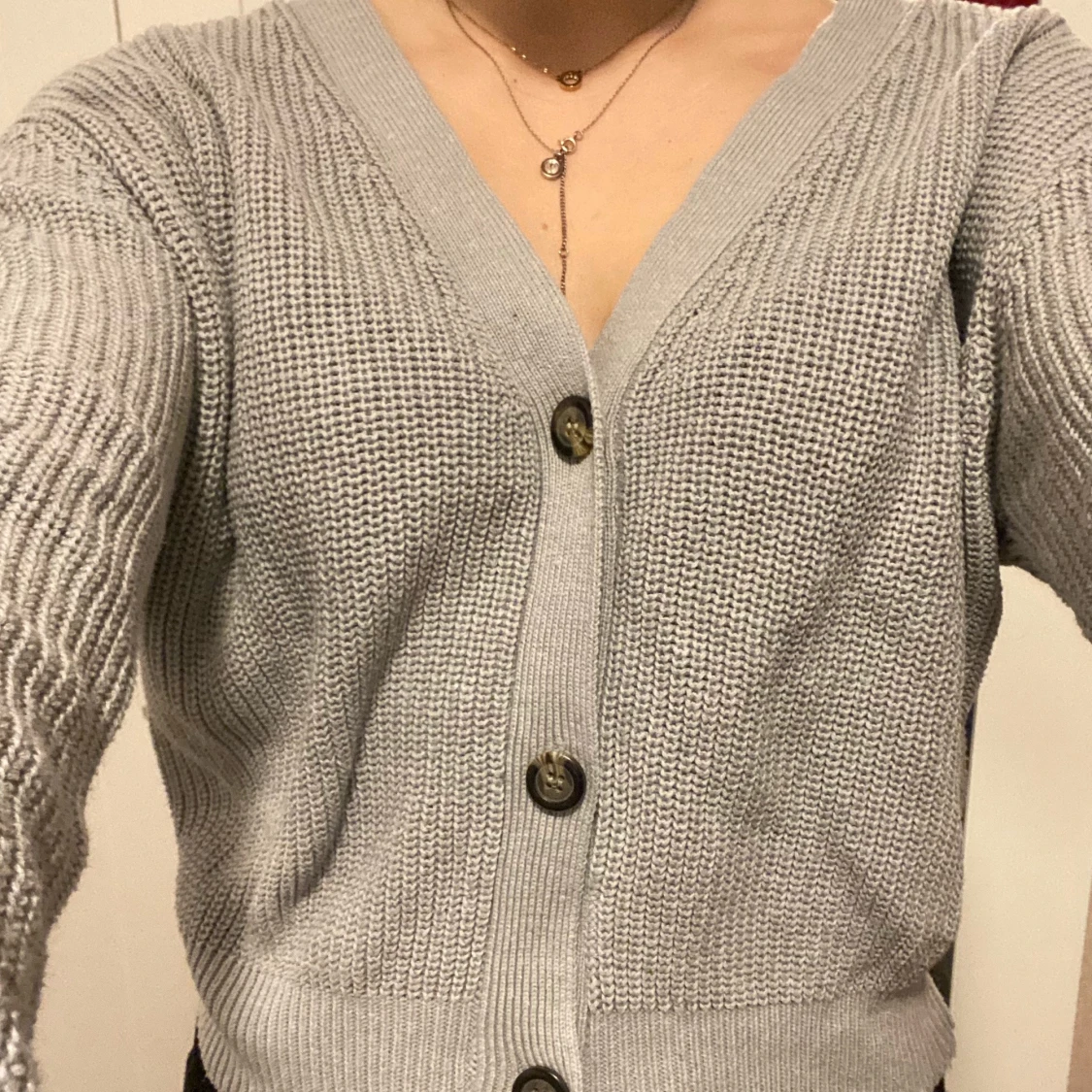 Blå/grå stickad med knappar - 90