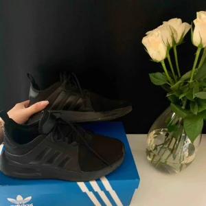  - Adidas x_plr i storlek 36 färg svart. Inte mycket använda. 