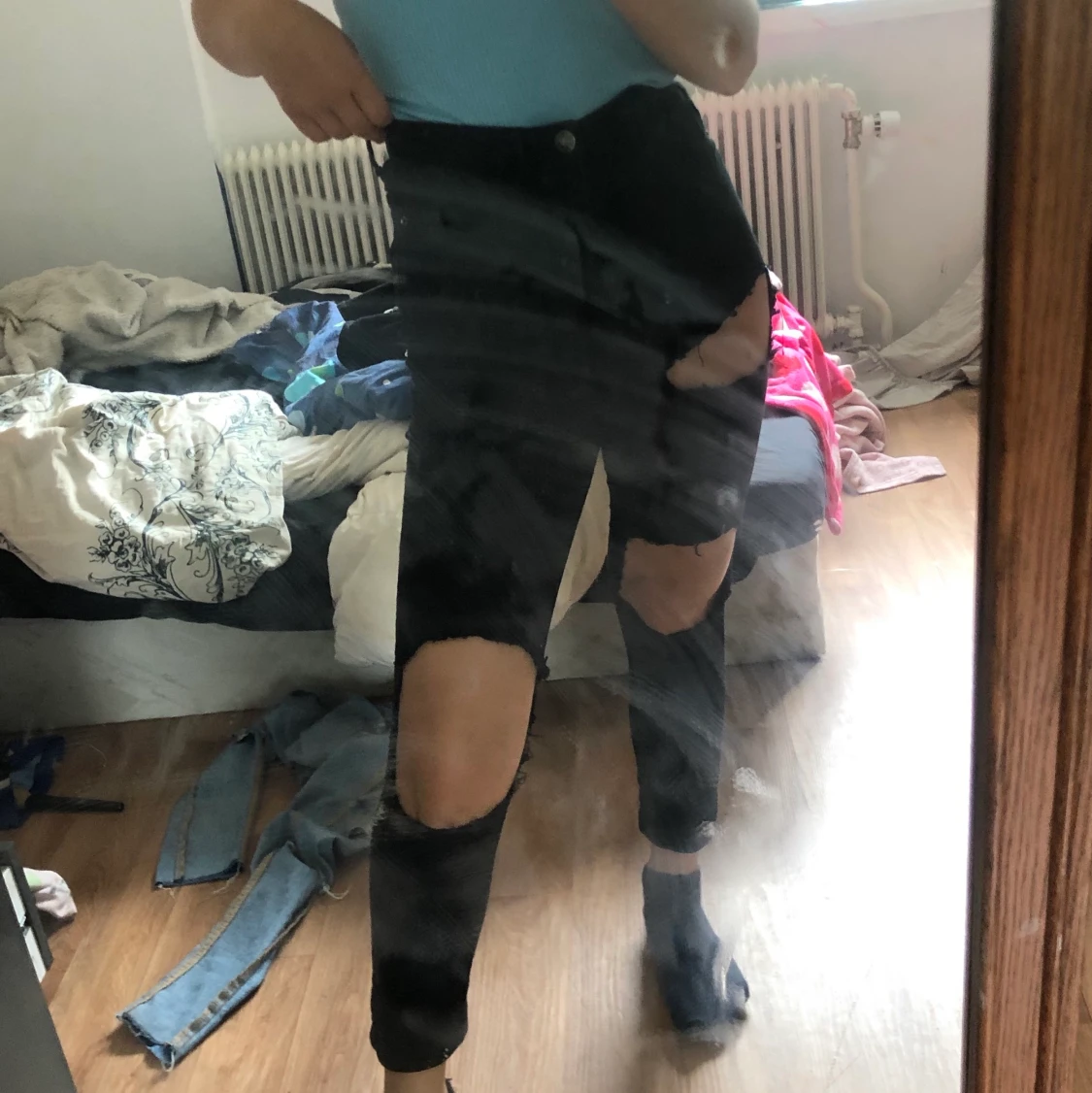 Högmidjade svarta jeans