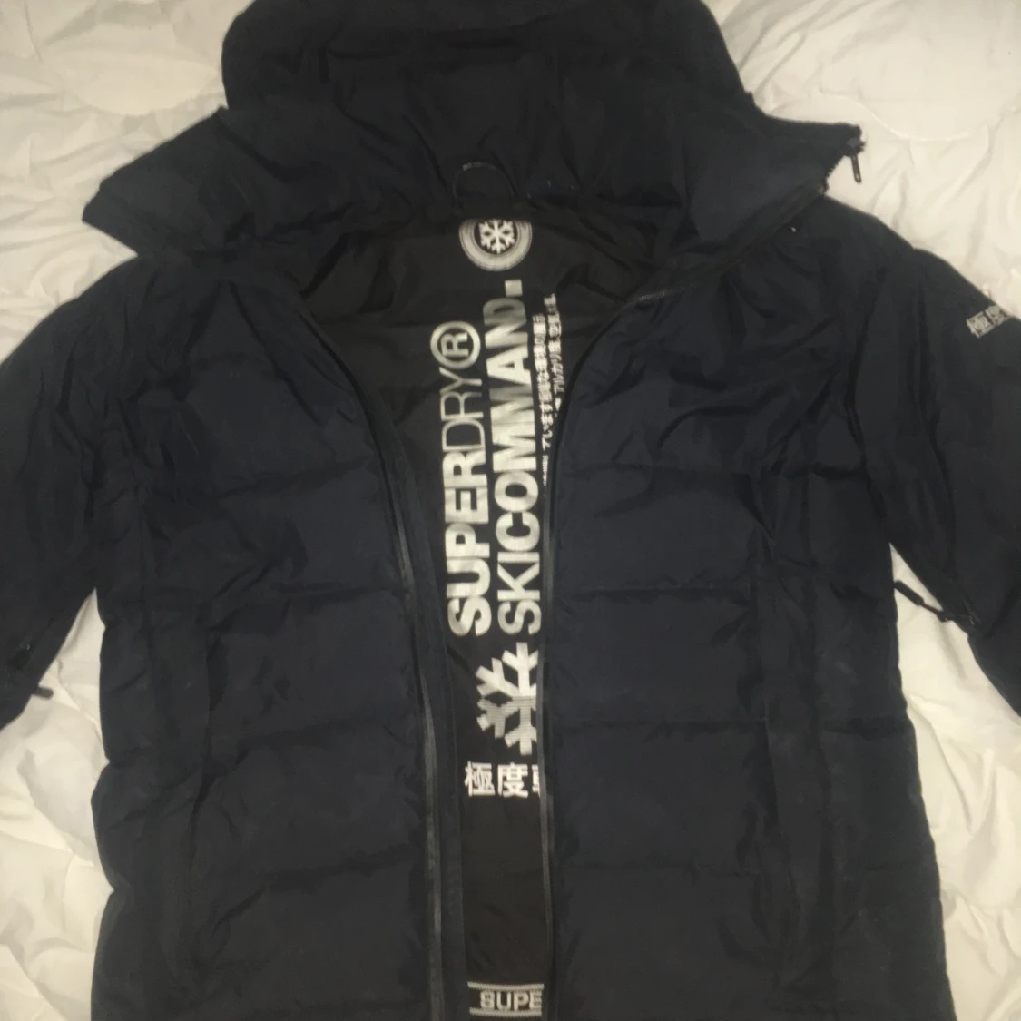 Varm Superdry vinterjacka i storlek M