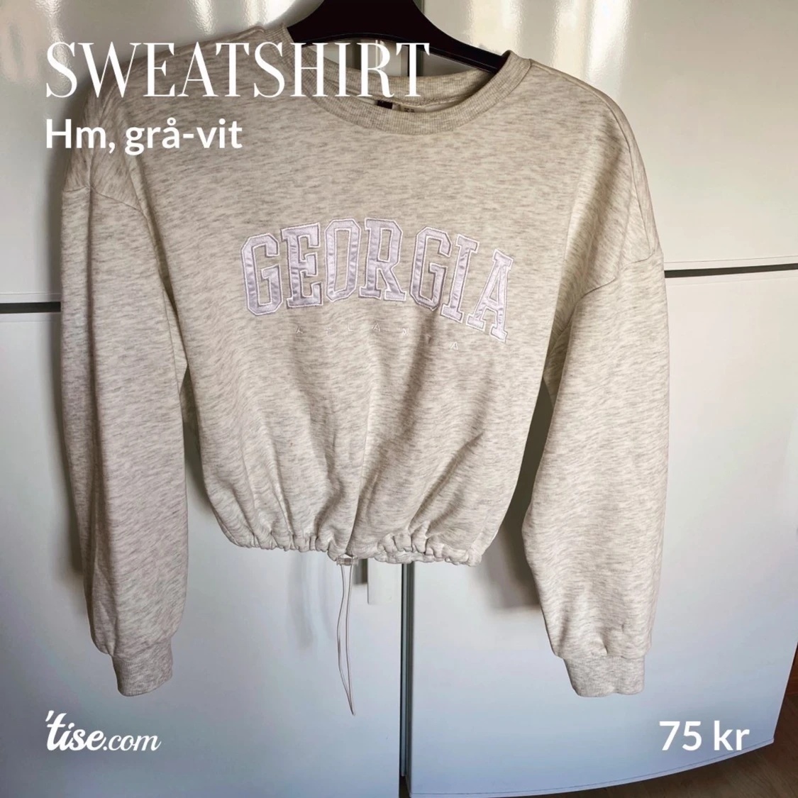 Grå-vit sweatshirt