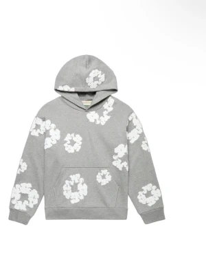 Grå hoodie med vita blommor - Snygg grå hoodie med vita blommönster över hela tröjan. Klassisk känguruficka framtill och huva. Perfekt för dig som vill sticka ut med en cool och lekfull stil. Mjuk bomullsblandning som känns skön mot huden.