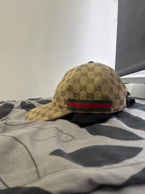 Gucci keps - Storlek L lite använd 