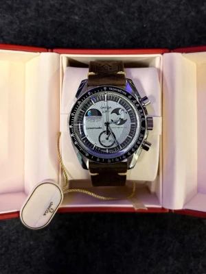 Omega x Swatch metal case. - Omega x Swatch moonSface transformed in a nice project into metal case and a luxury genuine leather strap.