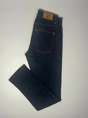 Nudie jeans Grim Tim - 👕 Plagg: Jeans                                                          📏 Storlek: 29/34                                                            🏷️ Märke/Modell: Nudie Grim Tim                                                ✨ Skick: Fint skick                                                        💬 Vid frågor är det bara att skriva!                                                                                          🛍️ Gramenti