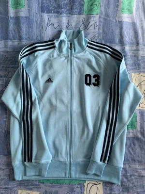 Vintage ADIDAS ’03 RANGE’ Tracksuit Top from 2003 - EXCLUSIVE ‘03 RANGE’.  BEAUTIFUL CONDITION.  HARDLY WORN..  XL SIZE.
