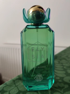 Fragrance World Elysia Sweet Banana  - Fragrance World Elysia Sweet Banana, ca 97-98ml kvar av 100. 