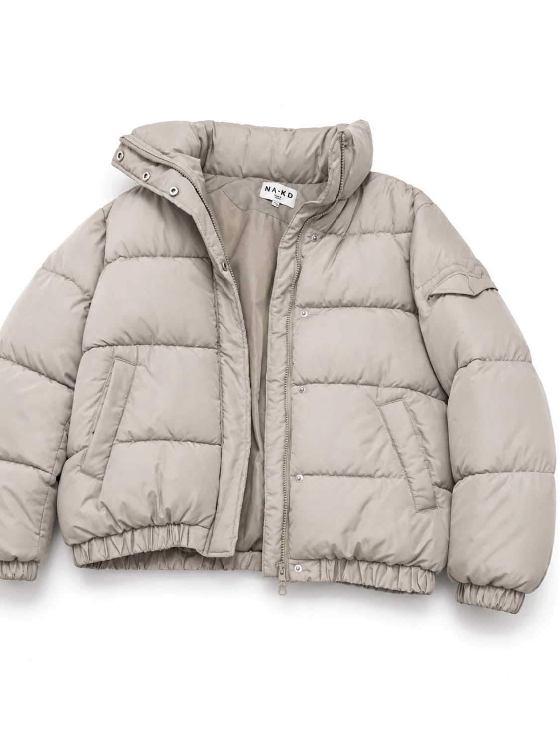 Beige pufferjacka från NA-KD