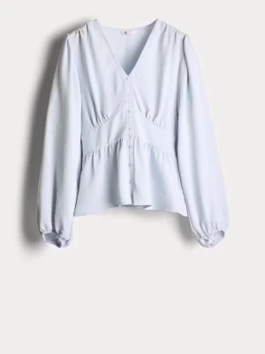 Ljusblå blus med v-ringning och knappar - Bara använd nån enstaka gång, storlek xs🥰