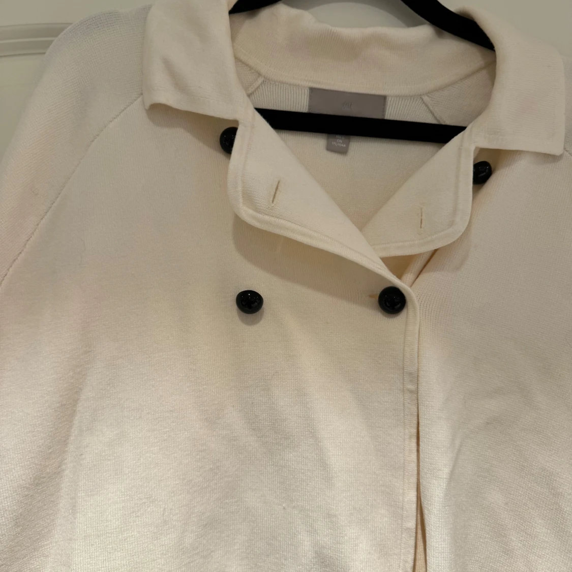 Beige jacka med knappar - 91