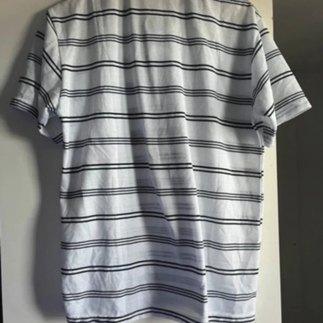 Vit och svart randig pikétröja från & Other Stories - 90