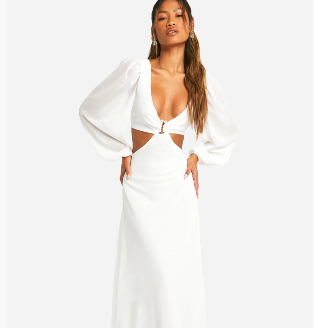 Vit långklänning med ballongärmar