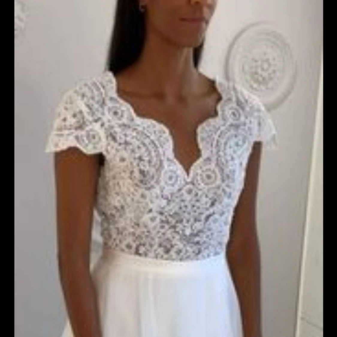 Vit brudklänning med öppen rygg. Oandvänd - 91