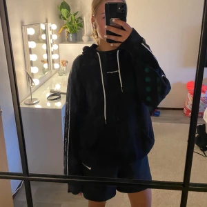 Hoodie - Hoodie från Champion i storlek M (herrmodell)