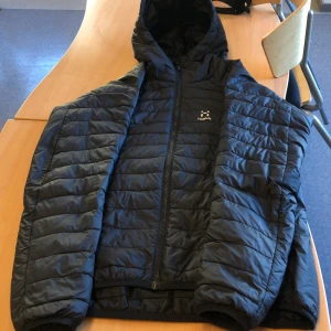 En Haglöfs jacka - En Haglöfs jacka dam den är skönt att man ska ha på sig på vintern.