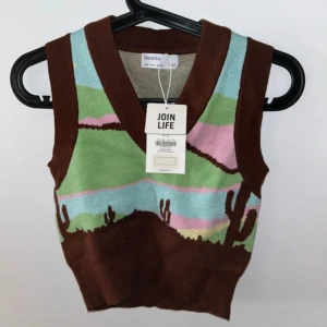 Stickad väst Bershka - Söt stickad färgglad väst med vestern motiv. Oanvänd med prislapp kvar