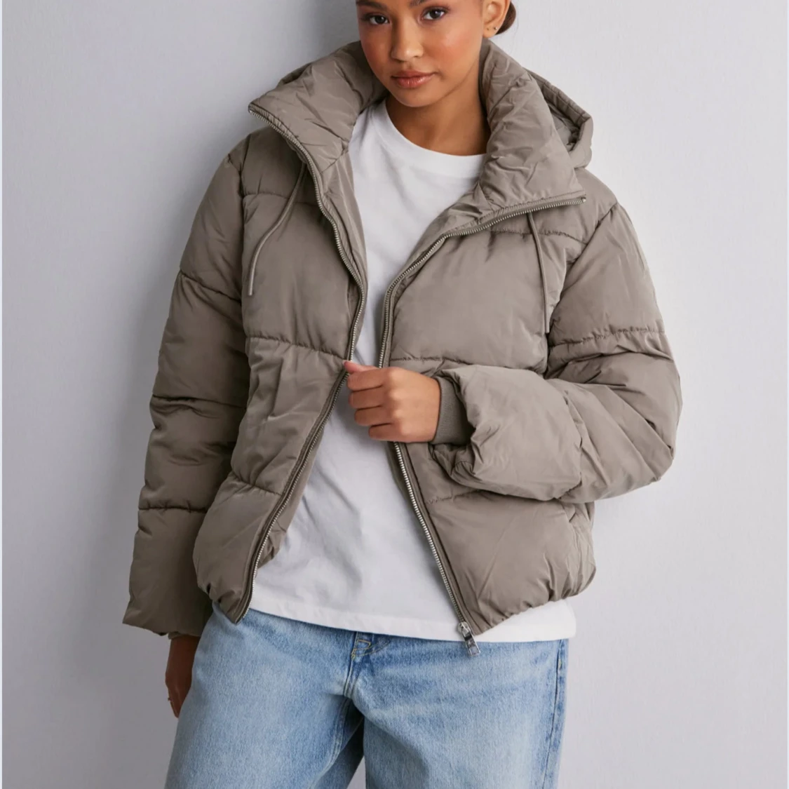 Beige pufferjacka från Nelly