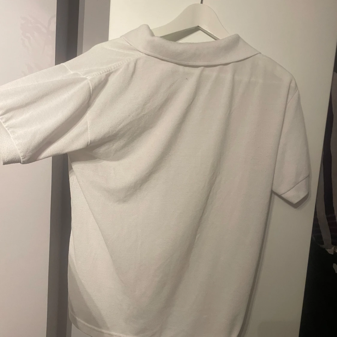 Vit pikétröja från Lacoste - 90