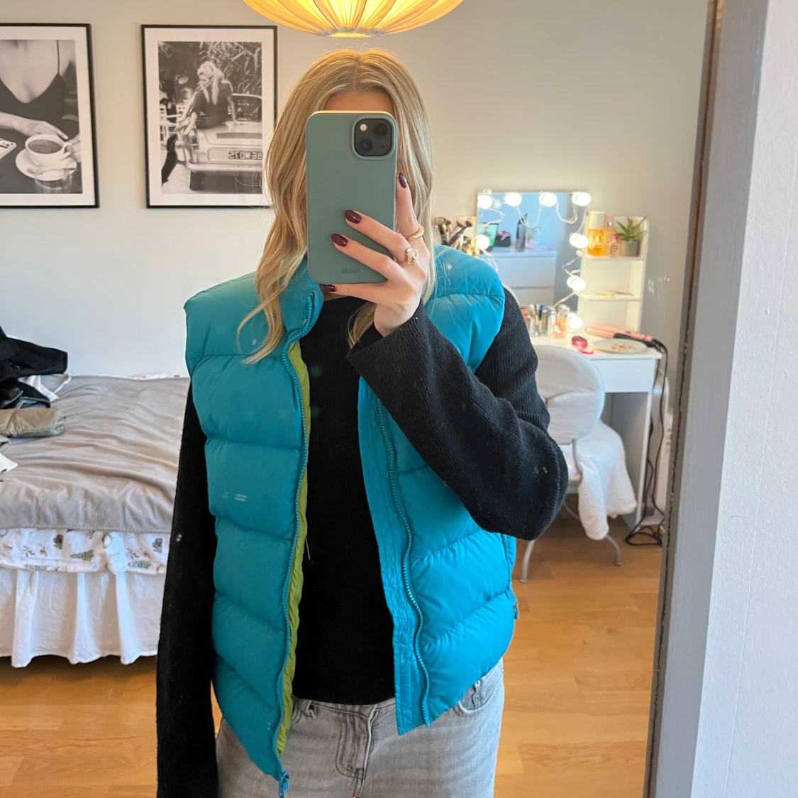 Turkos dunväst med dragkedja