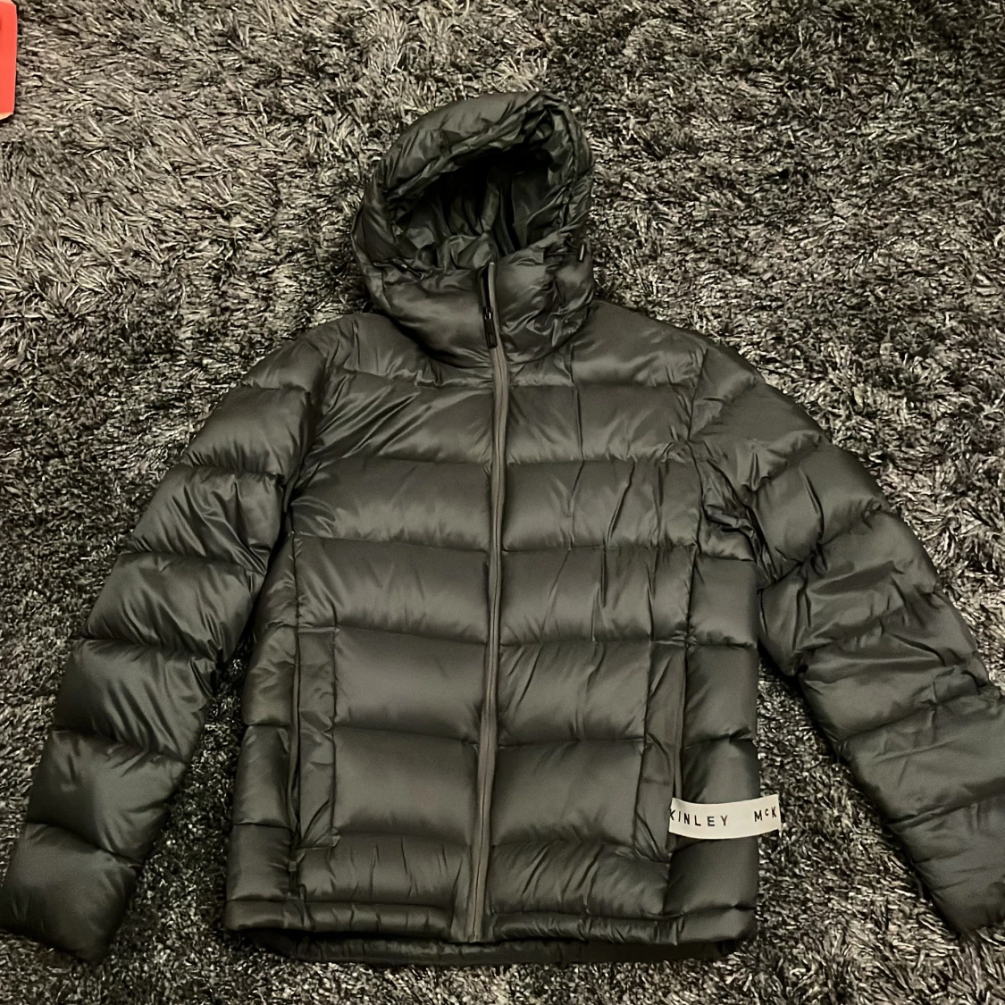 Mörkgrön pufferjacka från McKinley