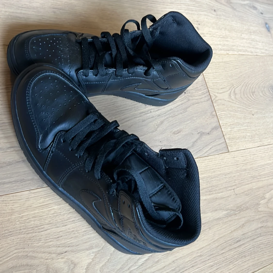 Svarta Nike Air Jordans - 1