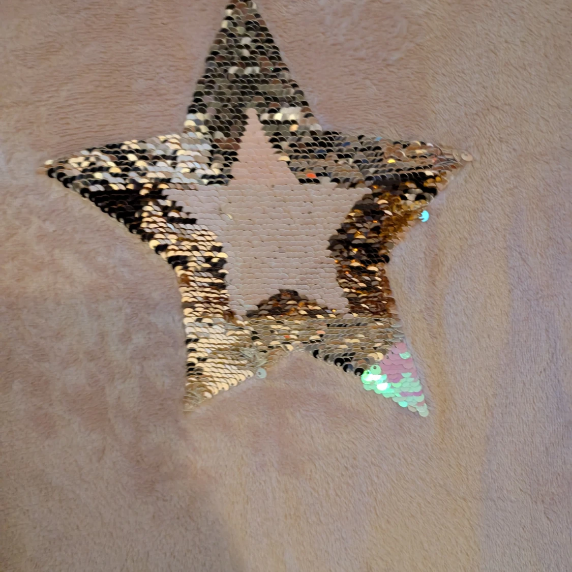 Rosa tröja med paljettstjärna - 90