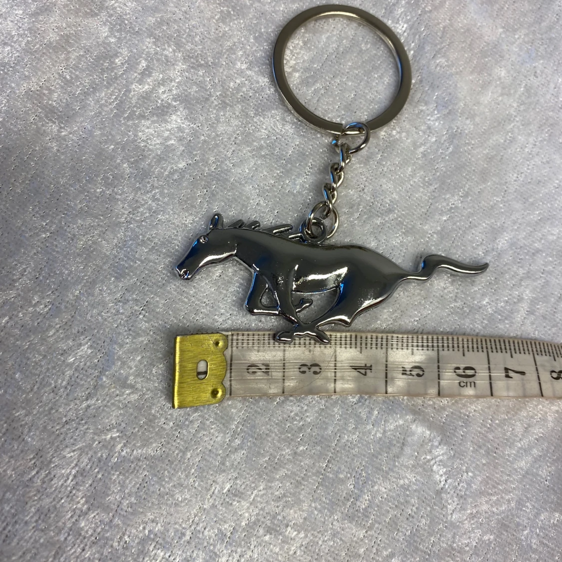 Nyckelringar med häst, motorcykel, fotboll och katt