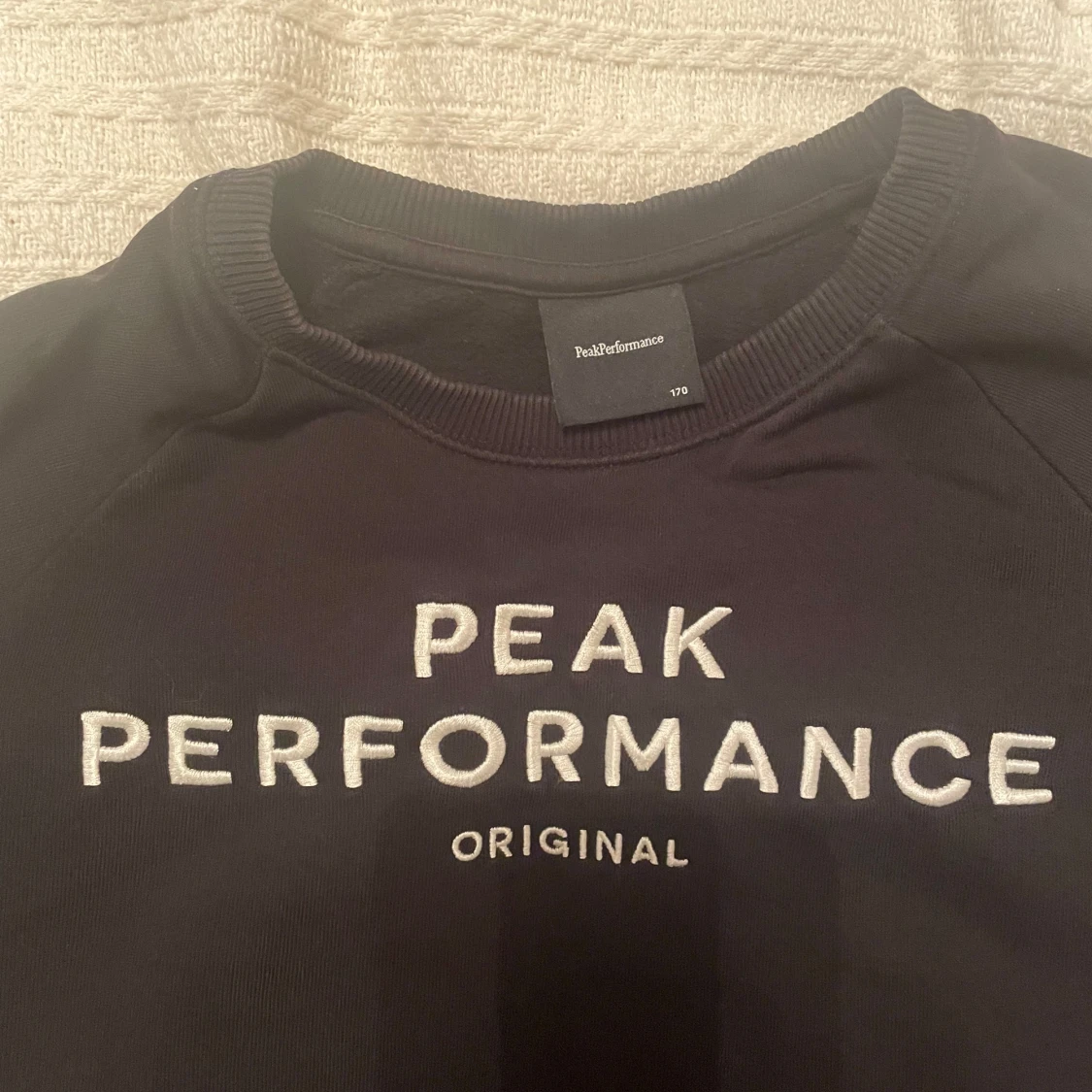 Svart tröja från Peak Performance strl 170 - 91