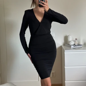 Klänning från Bik Bok - Snygg klänning från Bik Bok. Med prislapp. Storlek XS