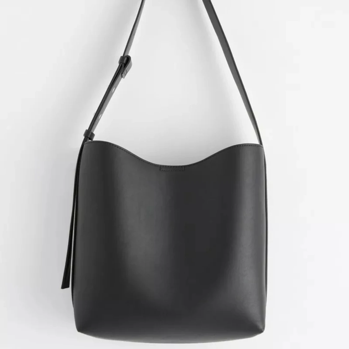 svart handväska  - 90