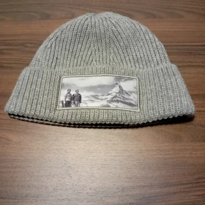 Revenite mössa - Bra scick aldrig använd