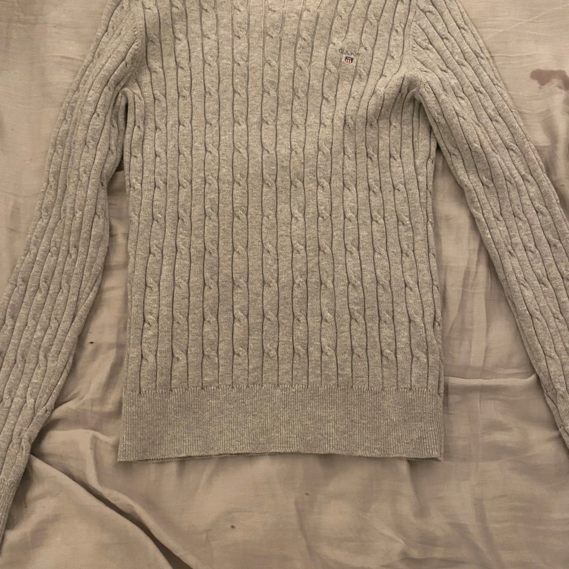 Grå kabelstickad tröja från Gant