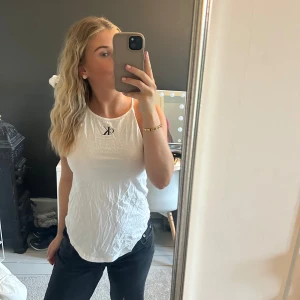 Calvin clein linne - Vitt Calvin clein linne i storlek s, nyskick