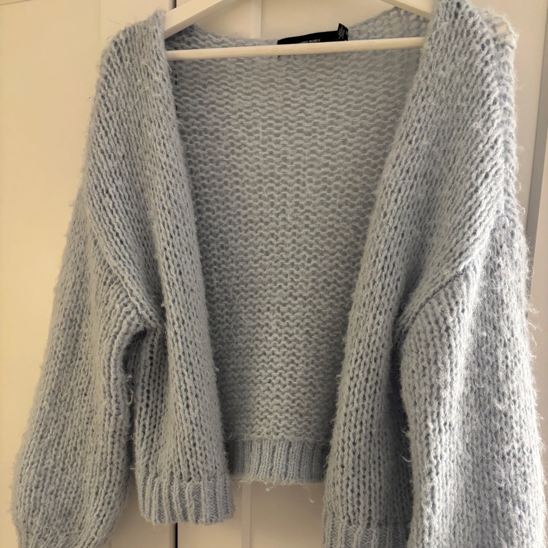 Ljusblå stickad kofta - 90