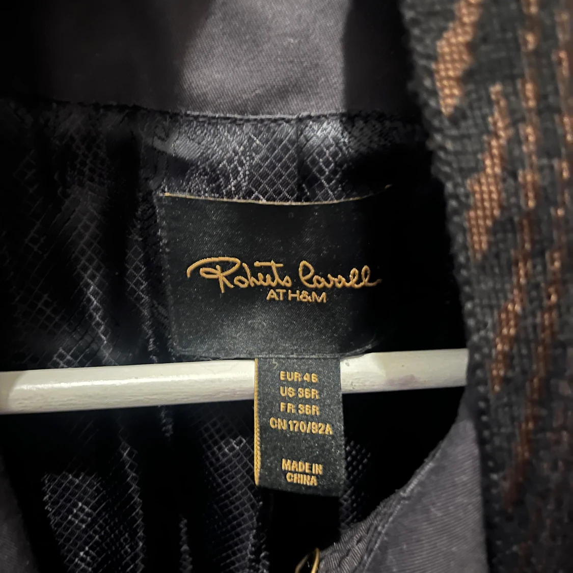 Svart trenchcoat från Roberto Cavalli at H&M - 90