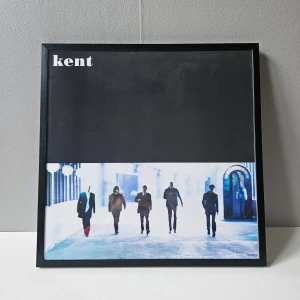 Kent - Affisch, 31.5x31.5  - Kent - Kent albumaffisch, 31.5x31.5   Helt ny - Passar bra i IKEAs tavelram Lomviken!  Skickas i papprulle - Ramen ingår inte!