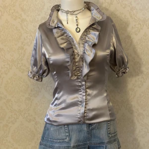 Shiny silver top - Lolita Silky sliver satin blouse with ruffle detail a little stretchy 