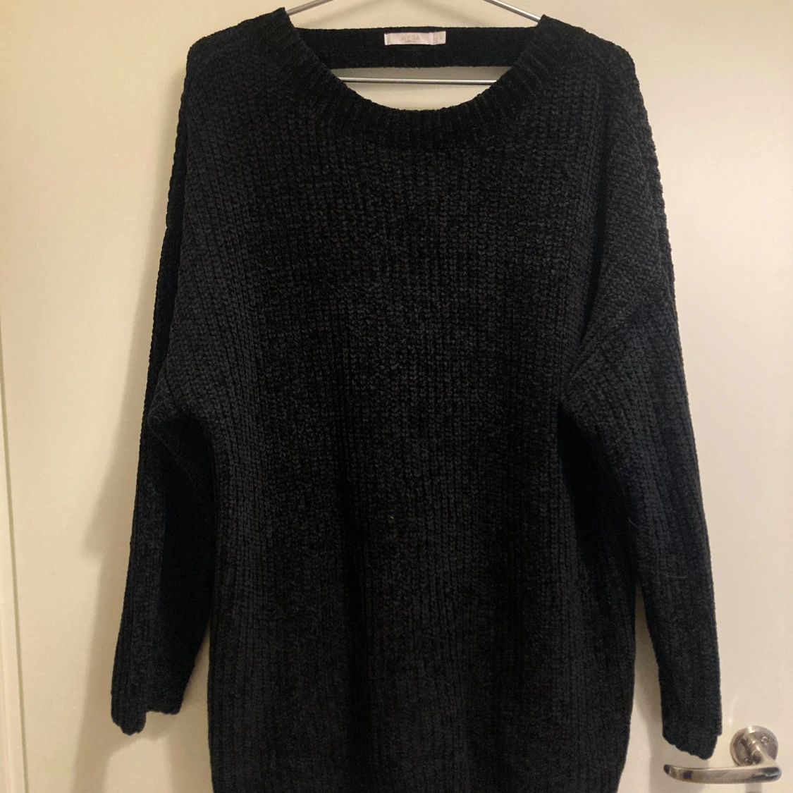Svart stickad tröja