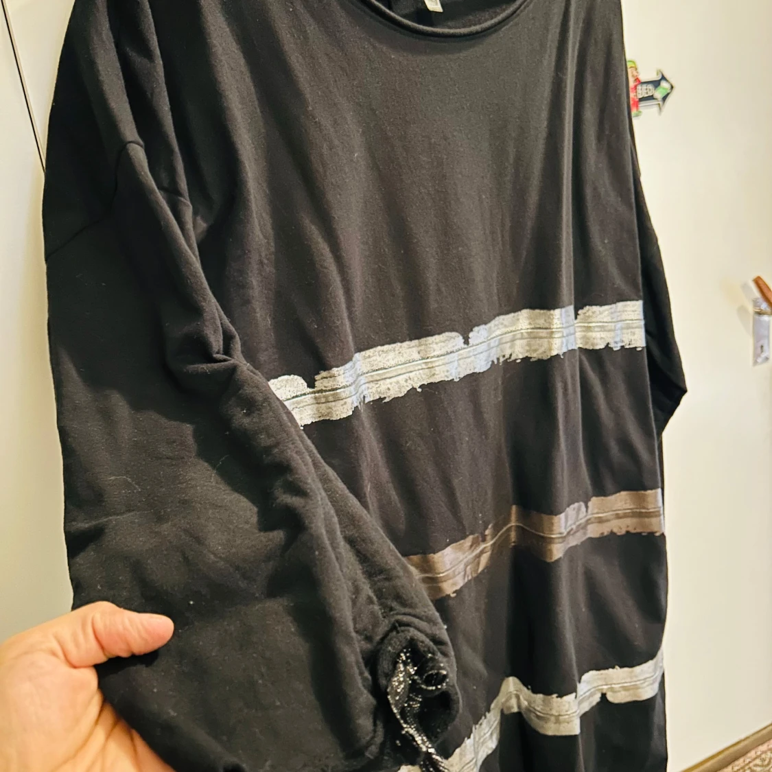 Svart klänning med silverdetaljer från Rainbow - 92