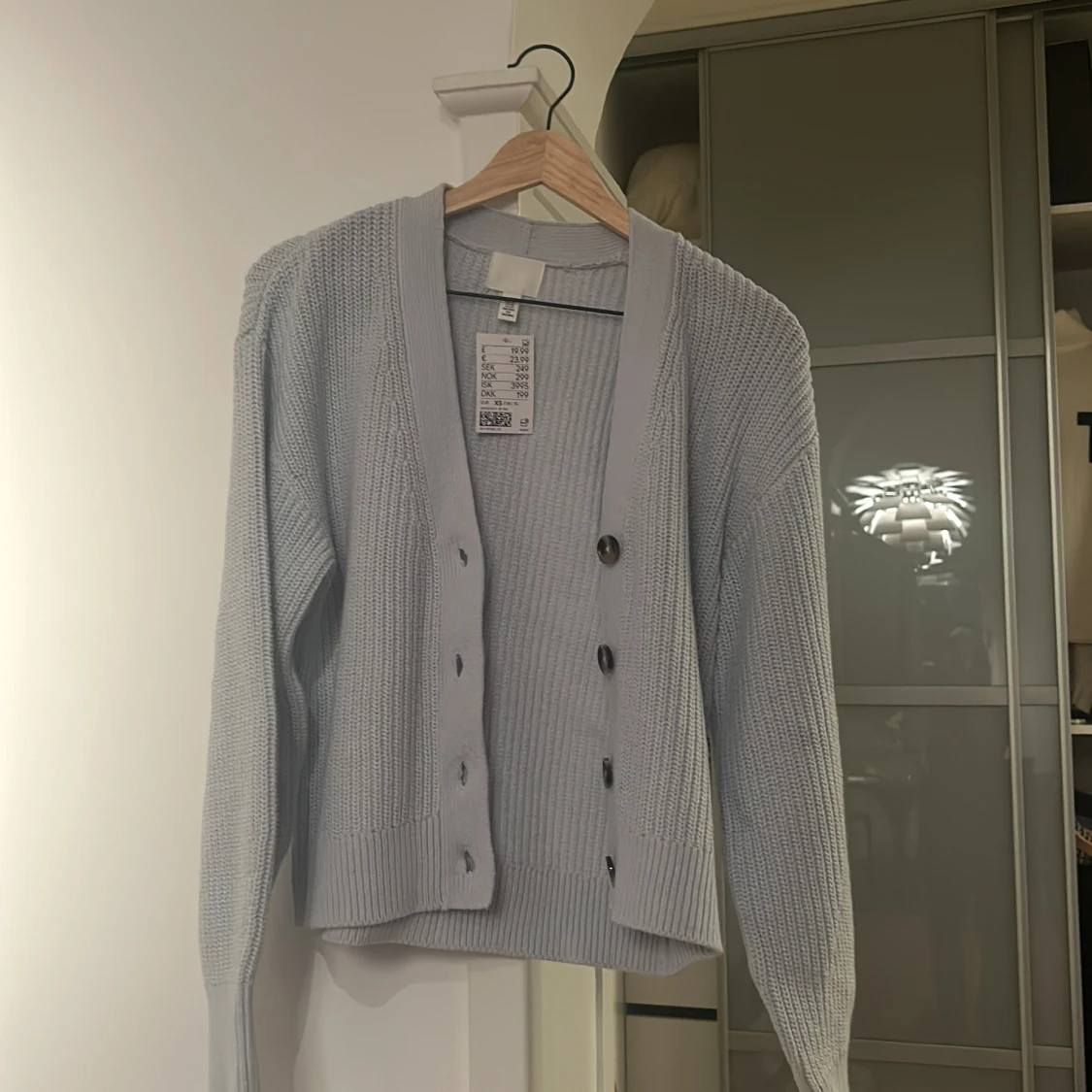 Ljusblå stickad kofta från H&M