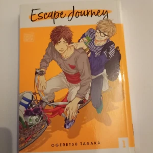 Manga; Escape Journey Volym 1 - Escape Journey Volym 1 av Ogeretsu Tanaka är en manga som utforskar relationer och känslor. Boken handlar om Naoto och hans återförening med exet Taichi på college, vilket väcker gamla känslor och konflikter. En berättelse om mognad och att hantera det förflutna.